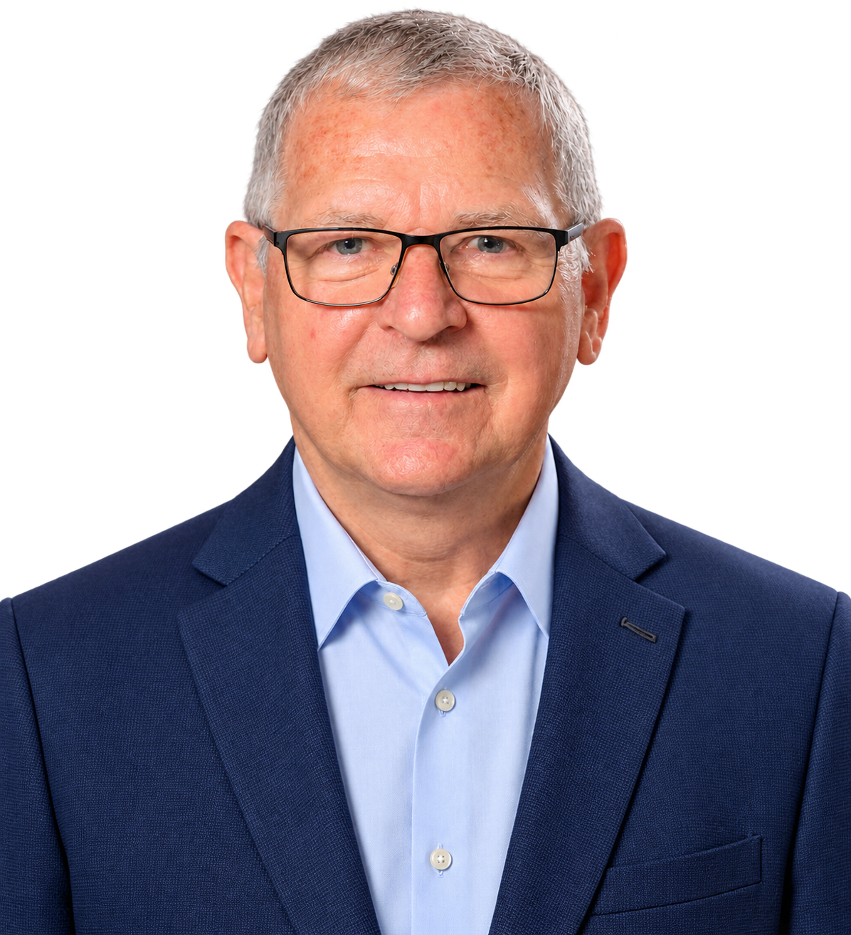 Bruce Mitchell wearing a navy jacket and light blue shirt